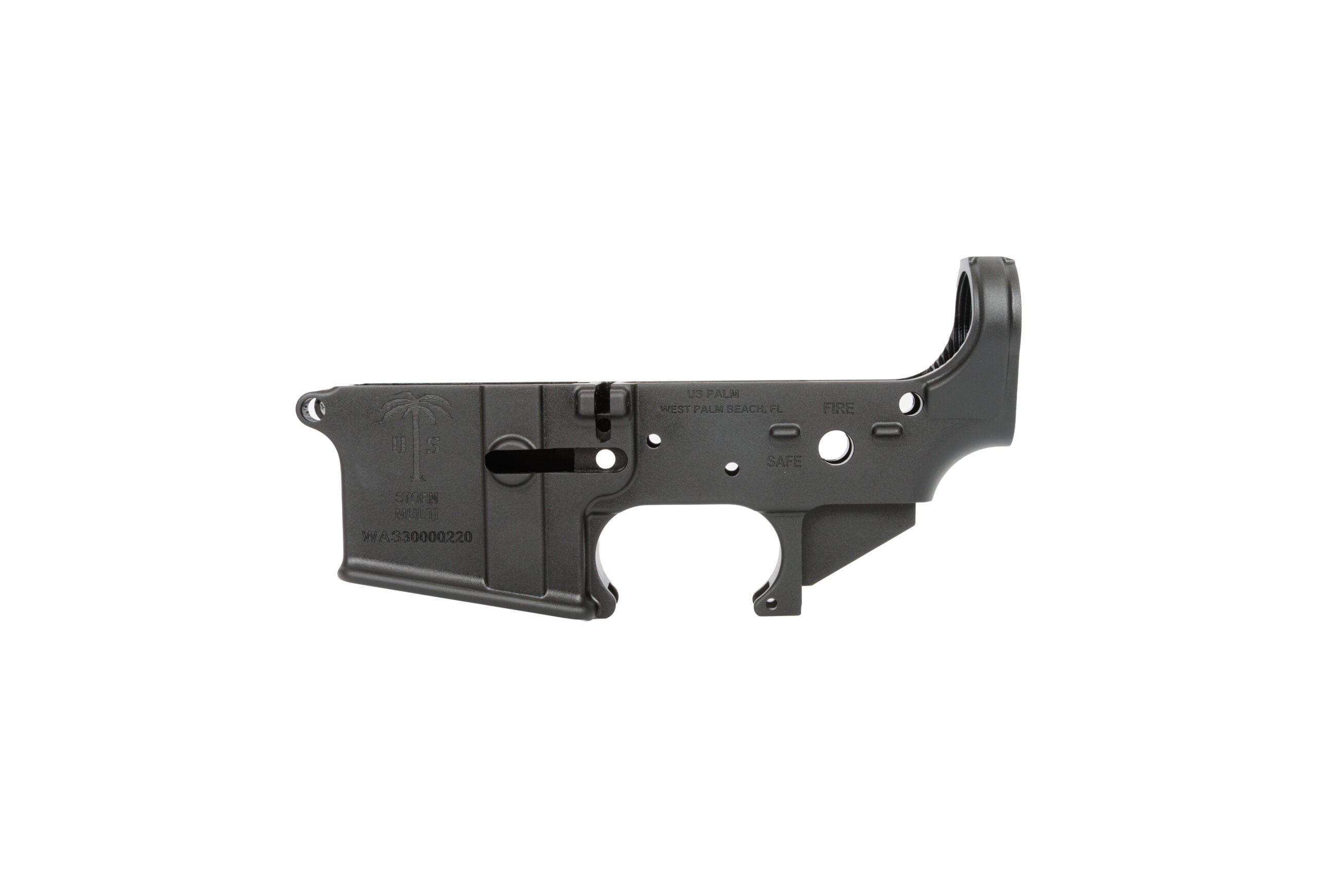 BA4A2276 MJ's Tactical Solutions Black firearm lower receiver with trigger guard and magazine well against a white background.